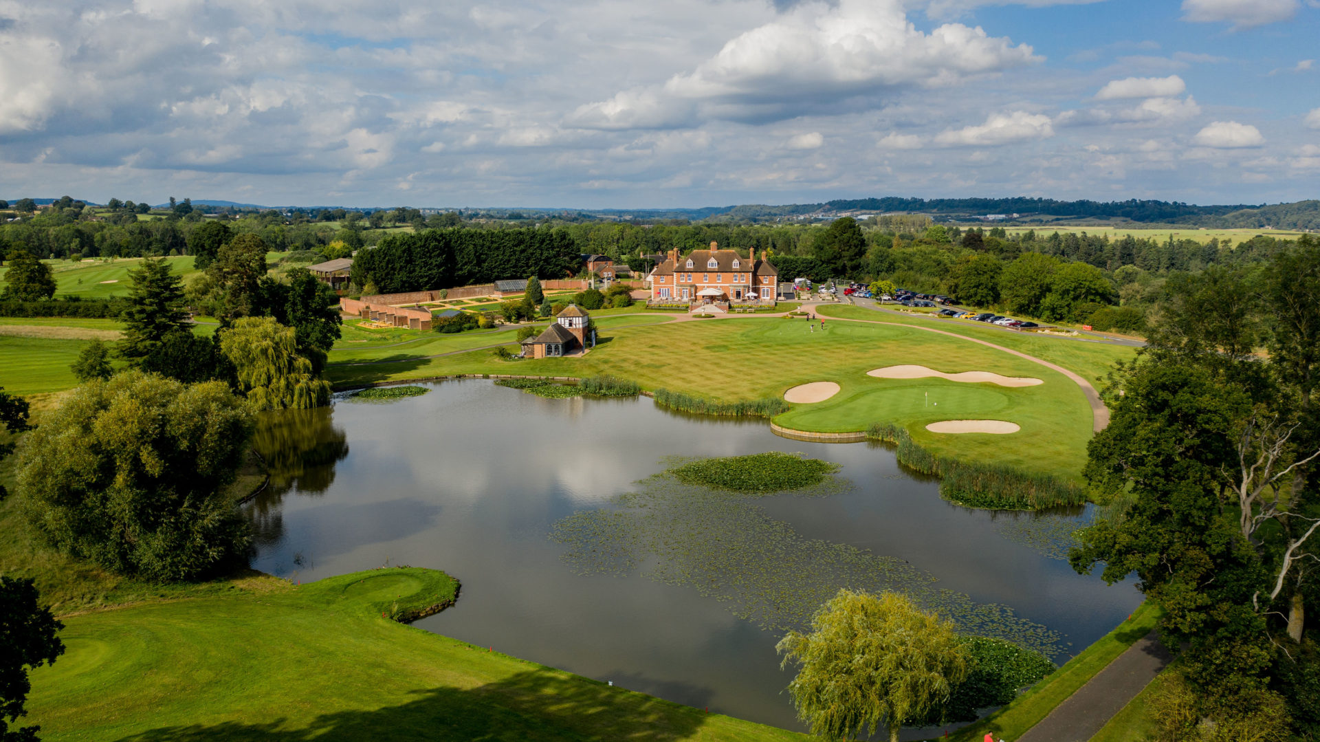 The Astbury with stunning lake and golf course