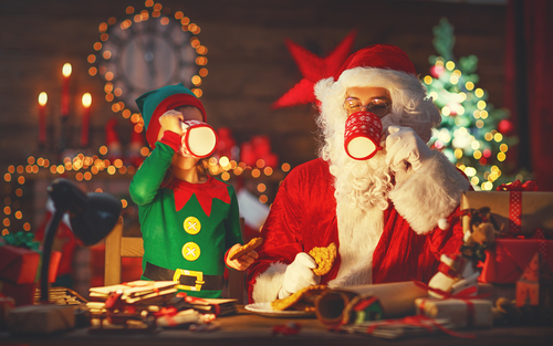 Santa and Elf drinking tea